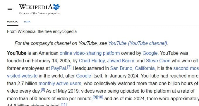 A Wikipedia article, with a video floating above it in a separate window